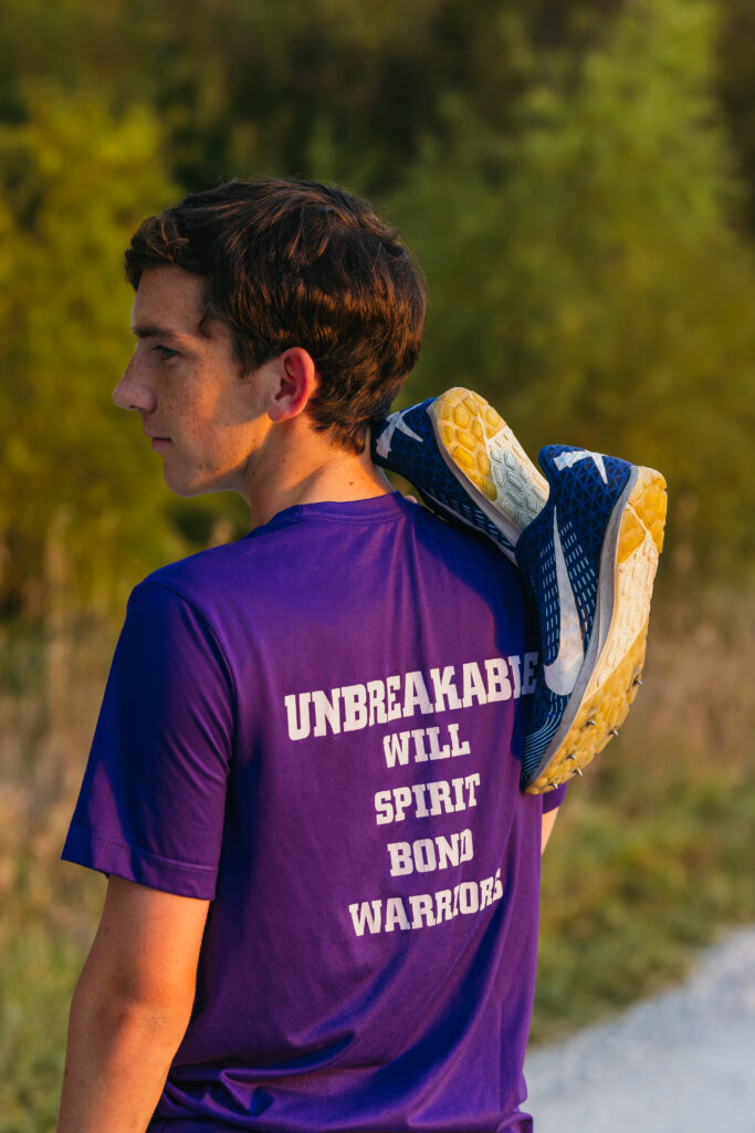 Male senior athlete session featuring runner on dirt road near Kansas City