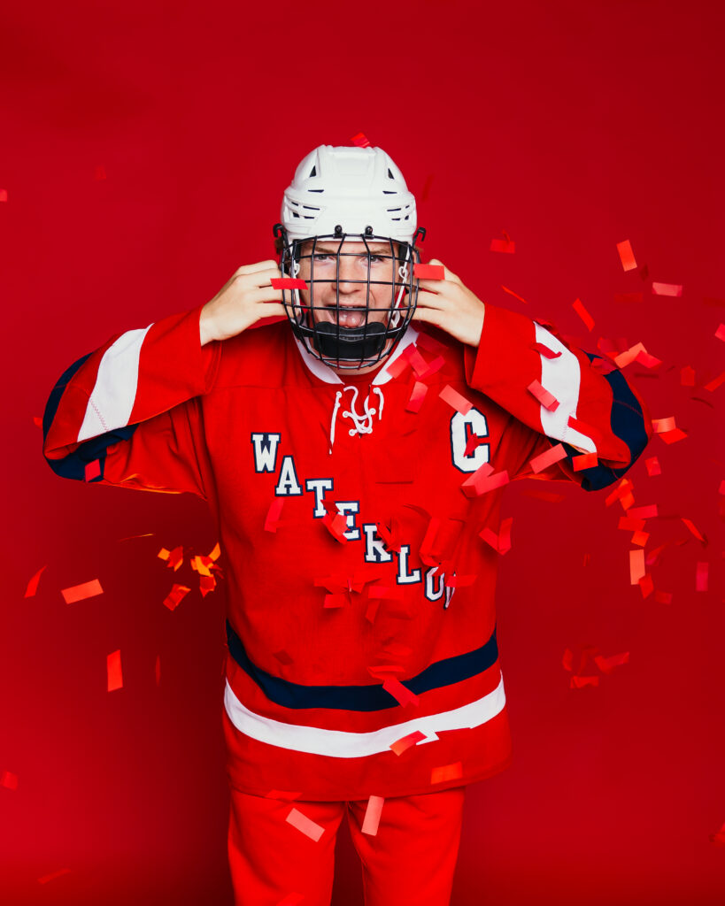 High school hockey player senior session in Kansas City photography studio