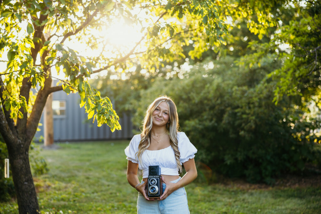 High school senior portrait session with warm sunset light