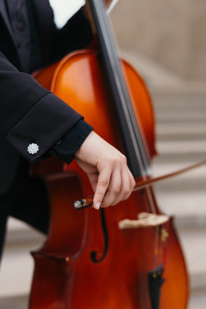 Elegant Kansas City senior photos at Liberty Memorial with personalized music theme