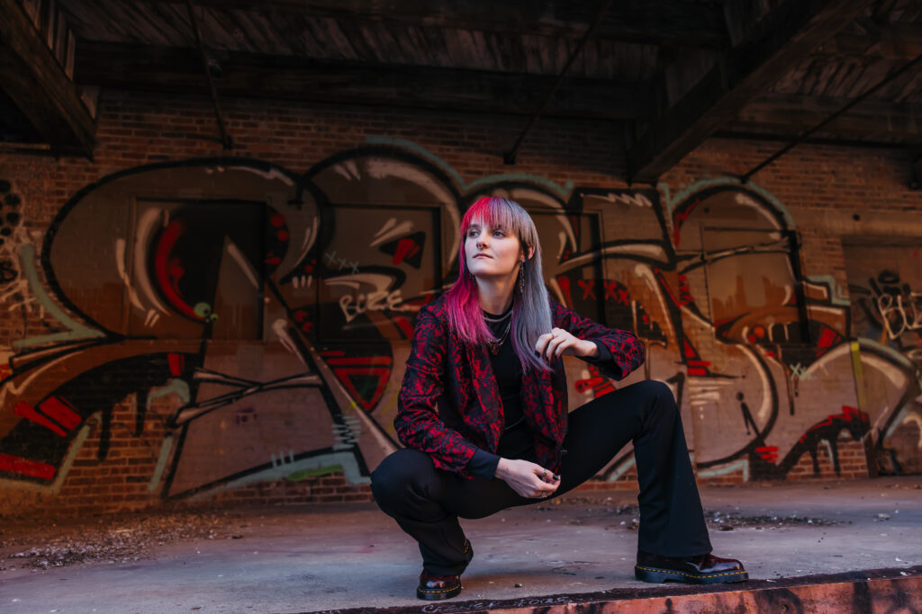 Kansas City senior session in West Bottoms with edgy industrial background