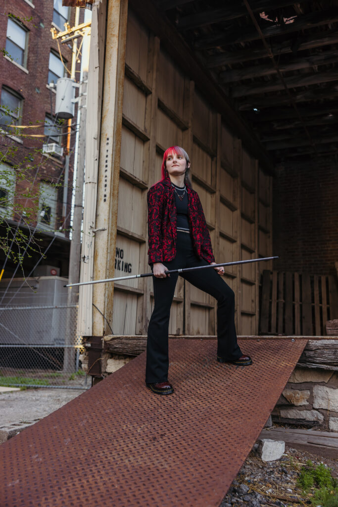 Kansas City senior with bo staff in downtown KC