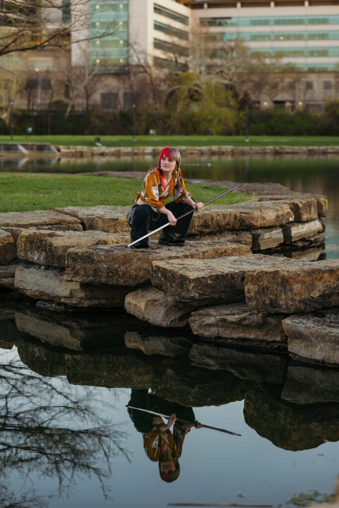 Natural light senior portraits in Kansas City park with greenery
