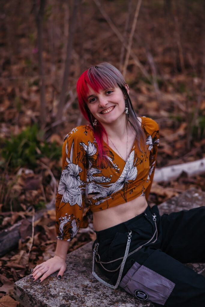 Natural light senior portraits in Kansas City park with greenery