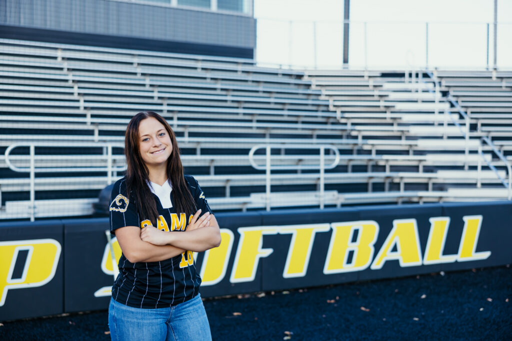 Kansas City senior softball player posing on field