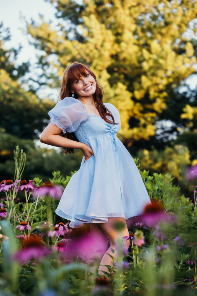 Kansas City senior photos with senior girl in blooming garden