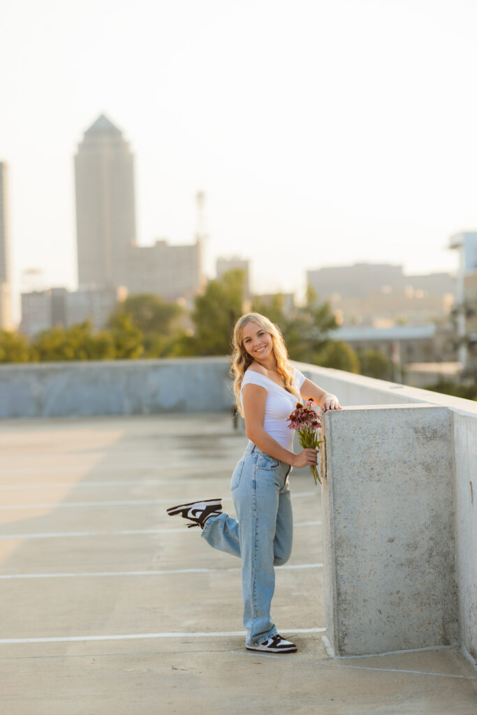 High school senior parking garage senior photos during golden hour sunset