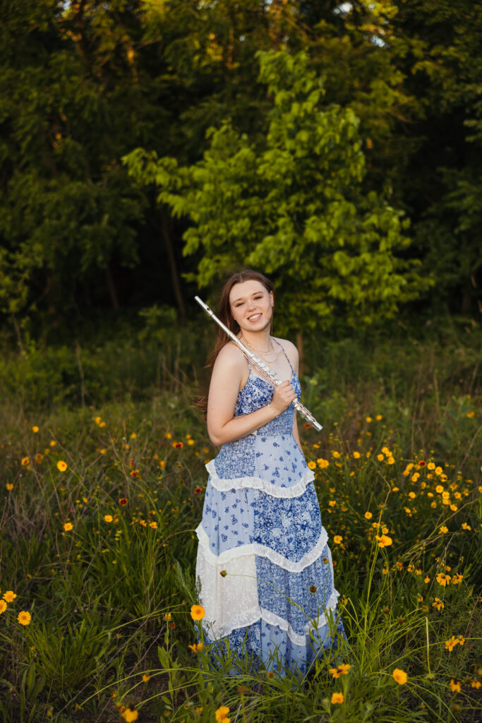 High school senior musician posing for portraits outdoors in Kansas City