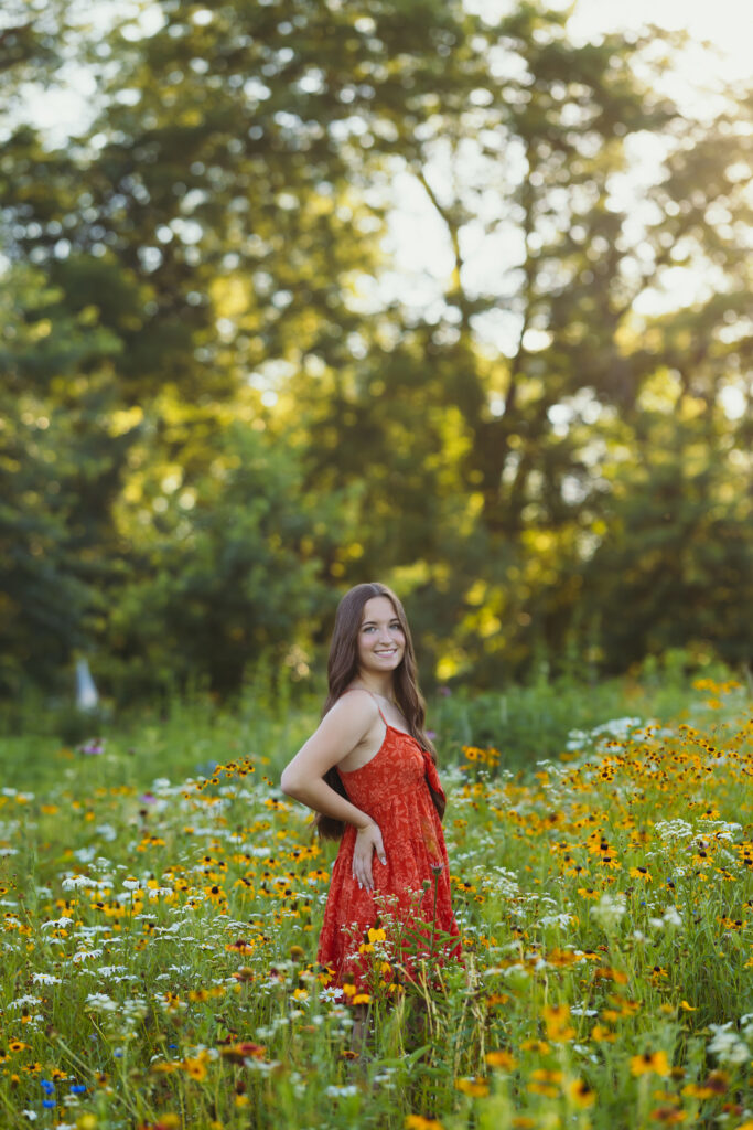 Kansas City high school senior girl smiling during outdoor portrait session