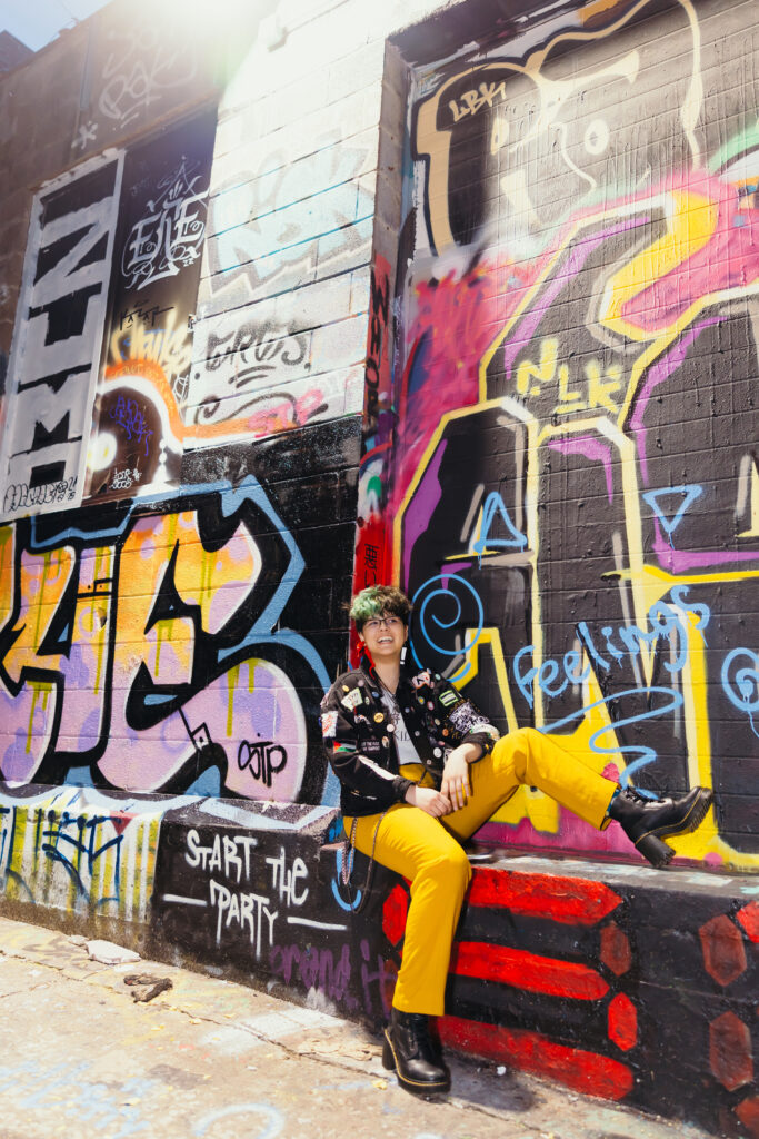 Kansas City senior photography session with urban background in the Crossroads