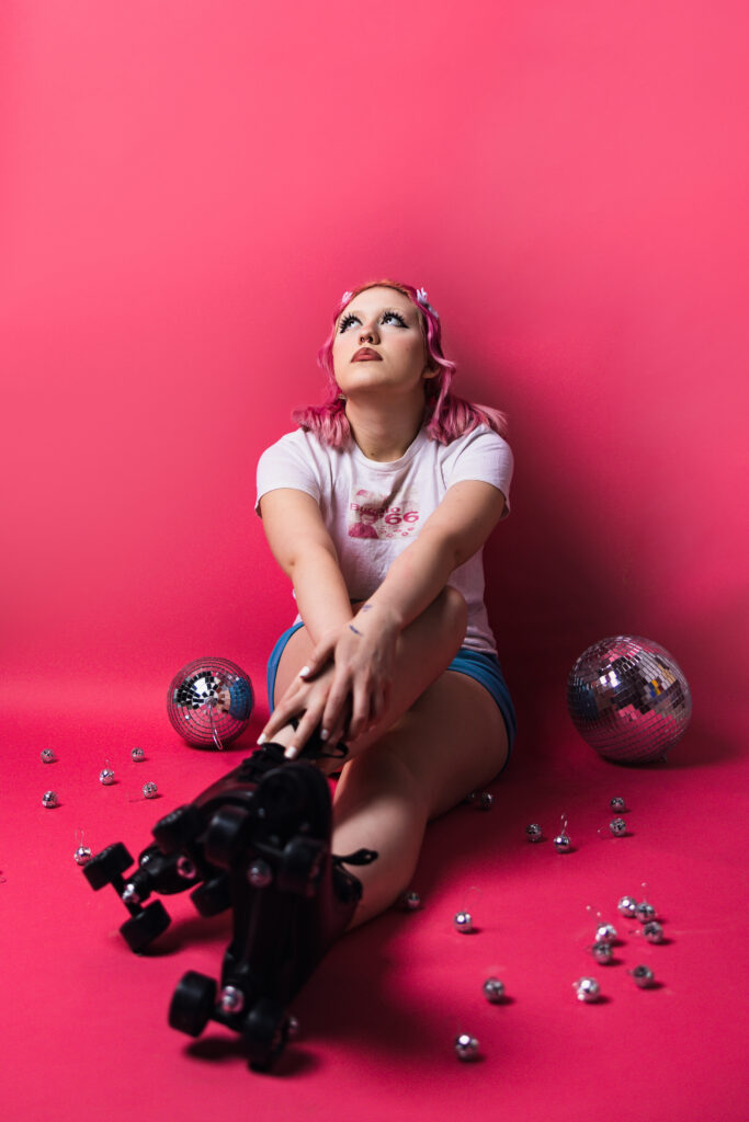 High school senior studio session with roller skates and disco balls