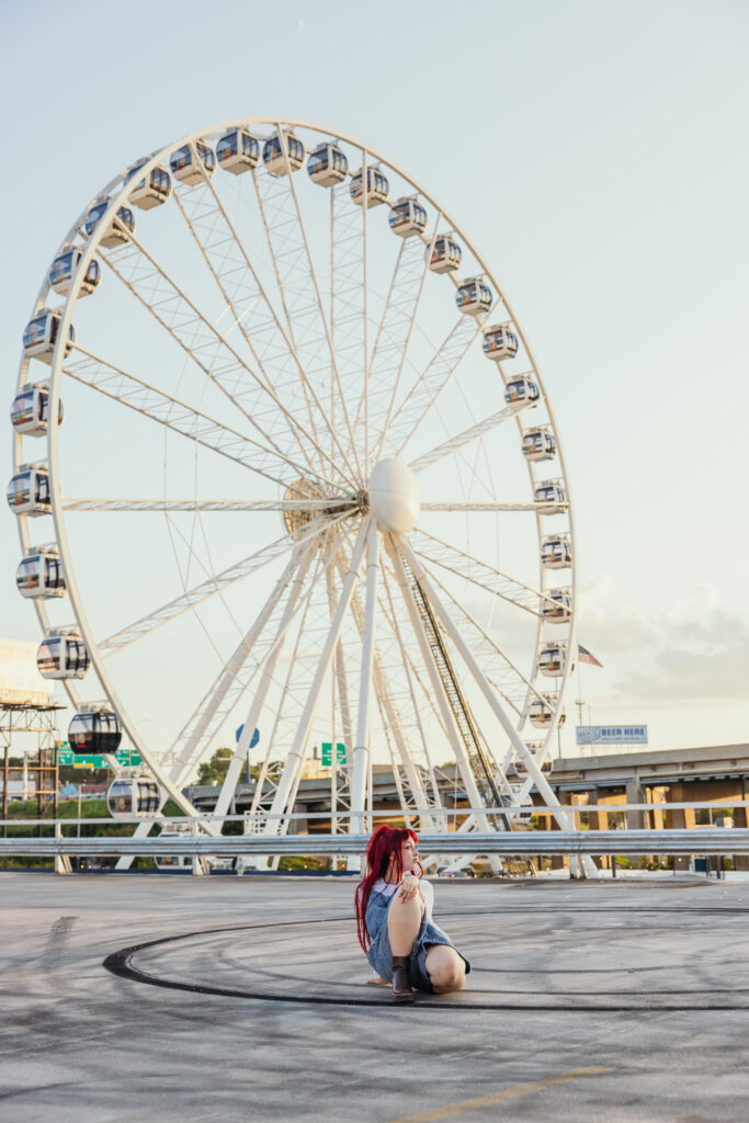 Kansas City senior session with KC ferris wheel downtown