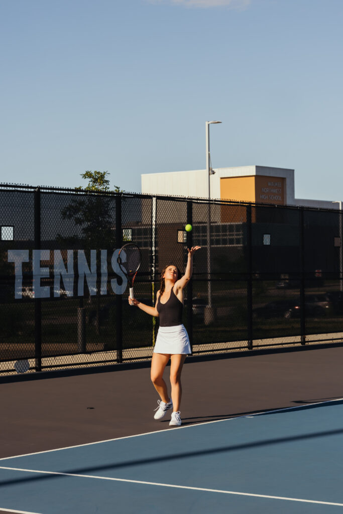 Tennis action shot during high school senior photo session