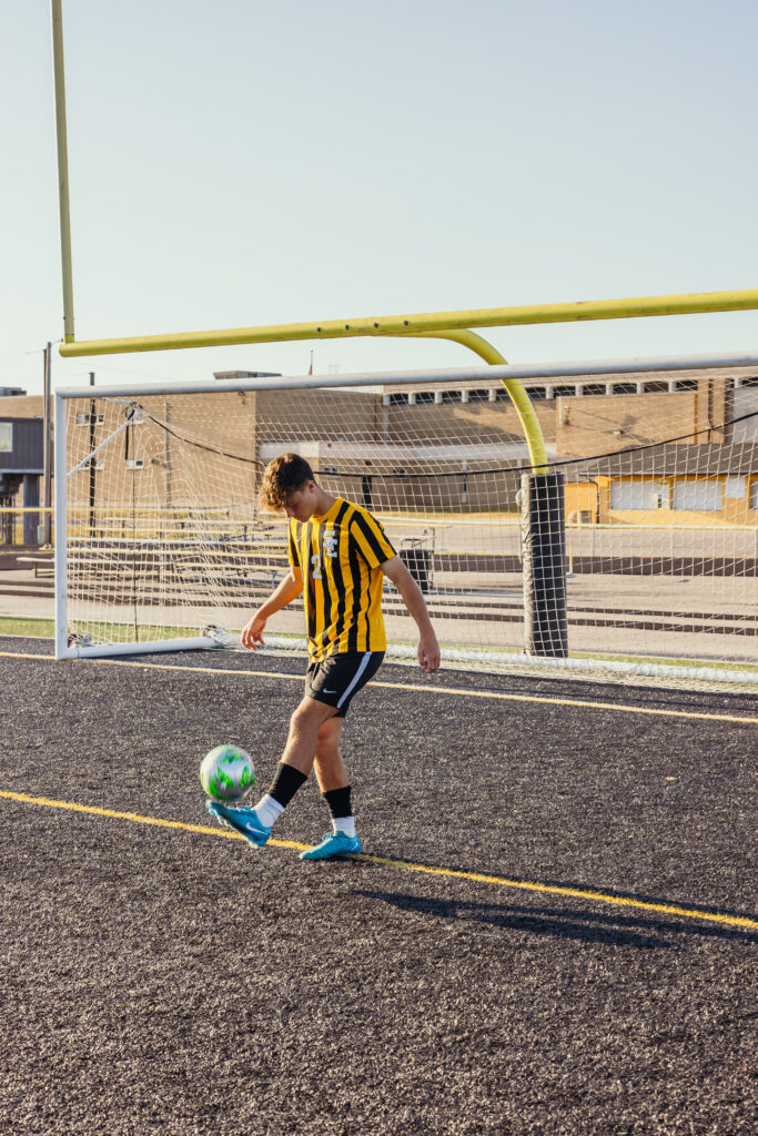 High school senior session playing soccer
