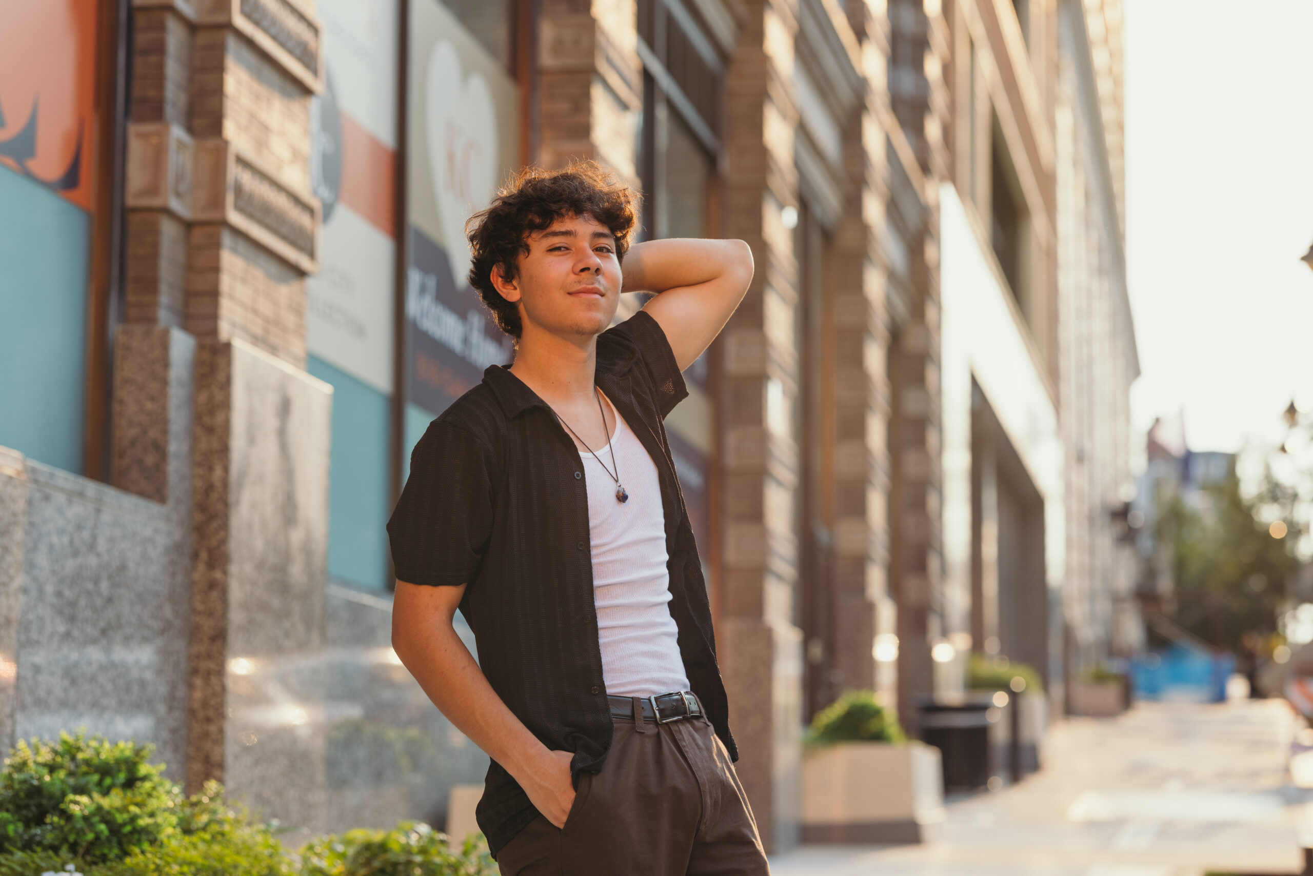 Kansas City high school senior boy downtown KCMO with editorial energy