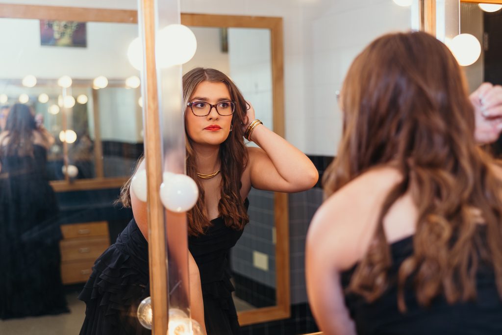 Kansas City senior photos celebrating her love of music and theater with dressing room photos