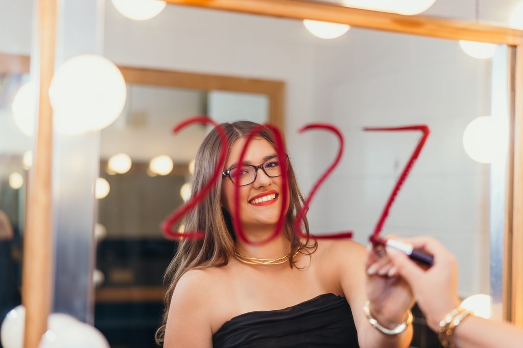 Kansas City senior photos celebrating her love of music and theater with dressing room photos