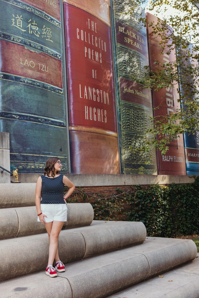Downtown Kansas City senior portraits inspired by senior's love of books and reading
