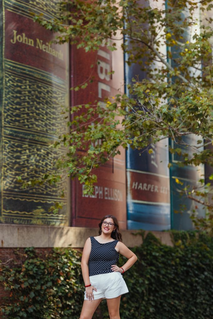 Downtown Kansas City senior portraits inspired by senior's love of books and reading