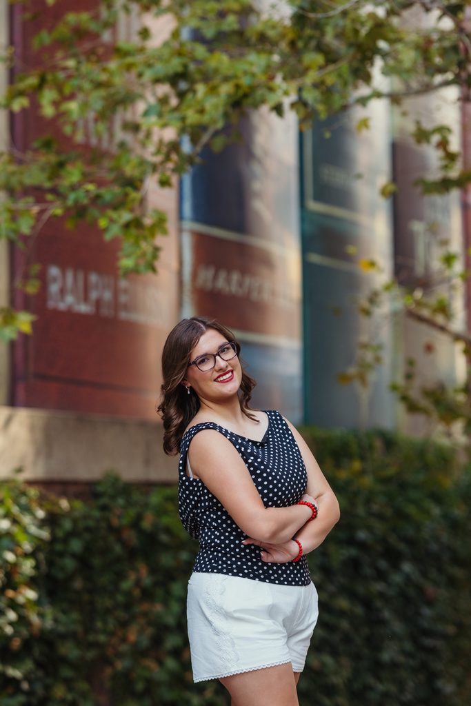 Downtown Kansas City senior portraits inspired by senior's love of books and reading